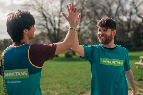 Supporters high fiving