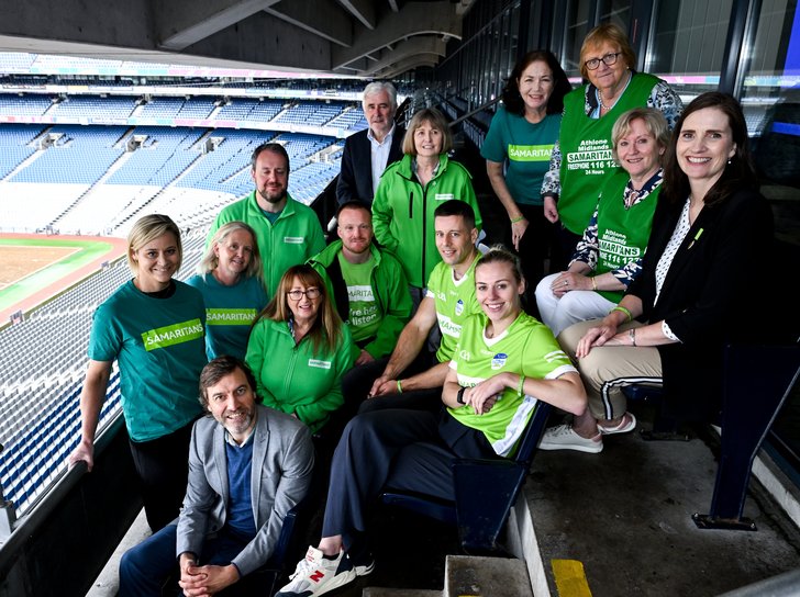 Samaritans volunteers with Limerick hurler Dan Morrissey and Dublin Ladies footballer Nicole Owens marking 10 years of the Samaritans GAA partnership