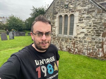 A photo of Andrew smiling