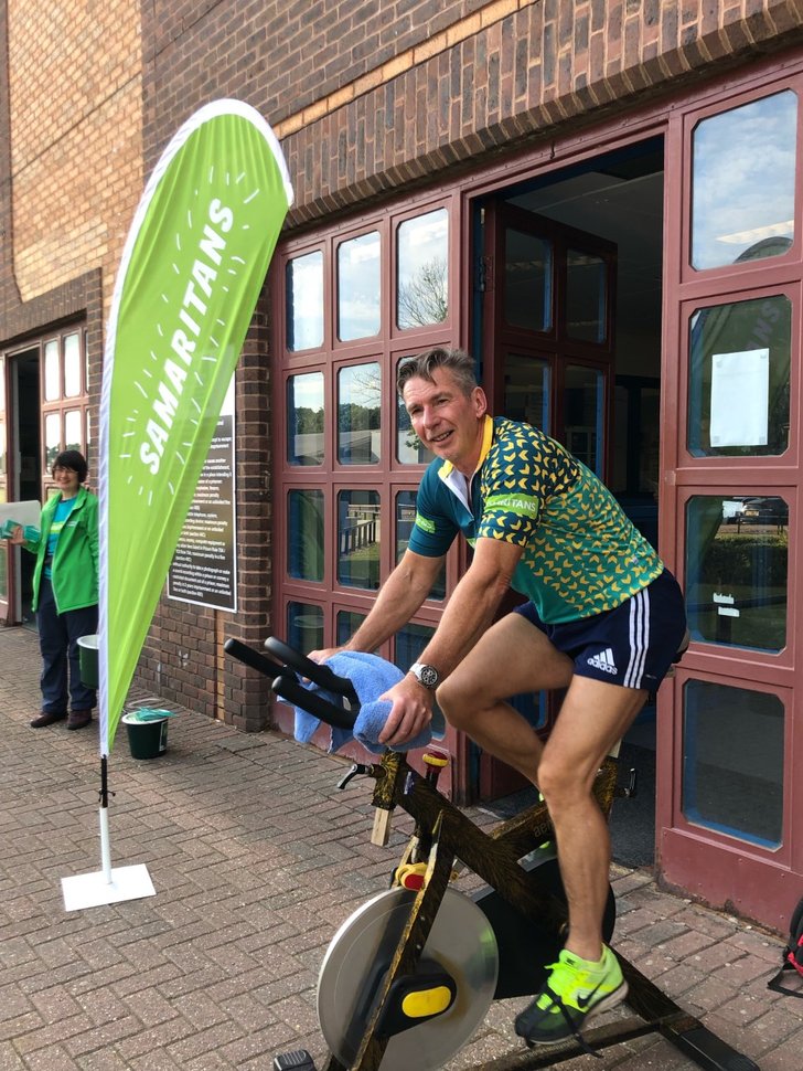 Ian on the bike and Jacqueline from Bexley & Dartford Samaritans in the background