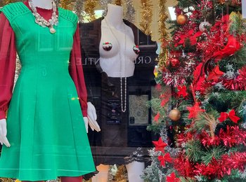 A colourful Christmas window at the charity shop of Samaritans of Edinburgh and the Lothians