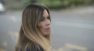 Woman-waiting-road