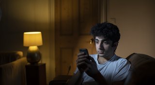 teen-holding-phone