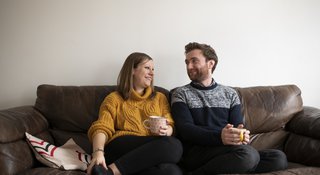 Couple-sofa-smile