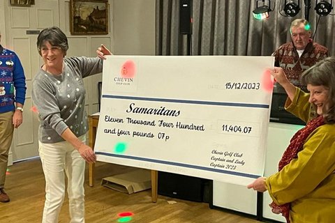Ladies Captain, Chevin Golf Club, Debbie Dawson presents Derby Samaritans with a cheque for £11,404 on behalf of herself and Captain David VIncent