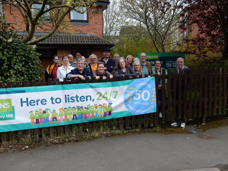 Banner & Volunteers -