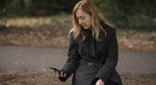 Woman-phone-look