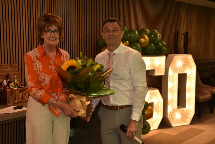 Rachael 1 gets acknowledgement for long-standing achievement from Dale 2