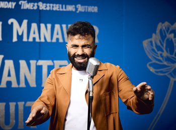 A photo of Hussain Manawer on stage