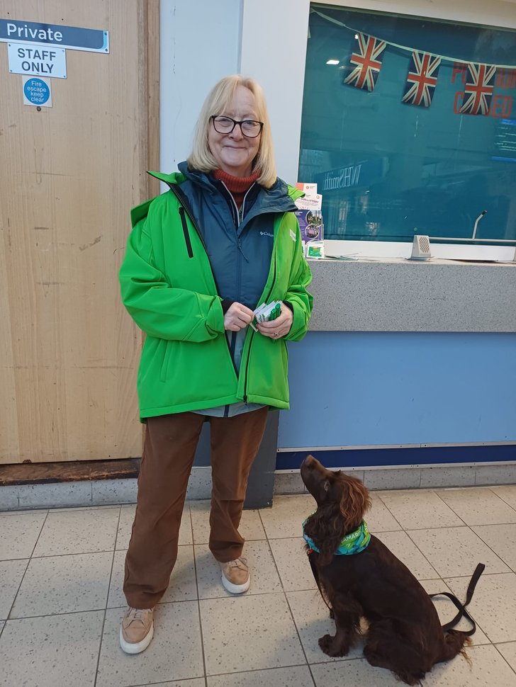 Helen smiling with dog