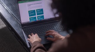 Hands using a laptop - Home_431_AR
