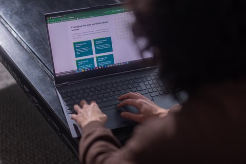 Hands using a laptop - Home_431_AR