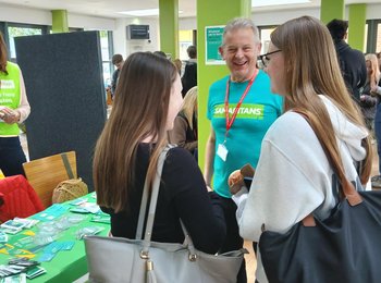 Students chatting to one of our volunteers