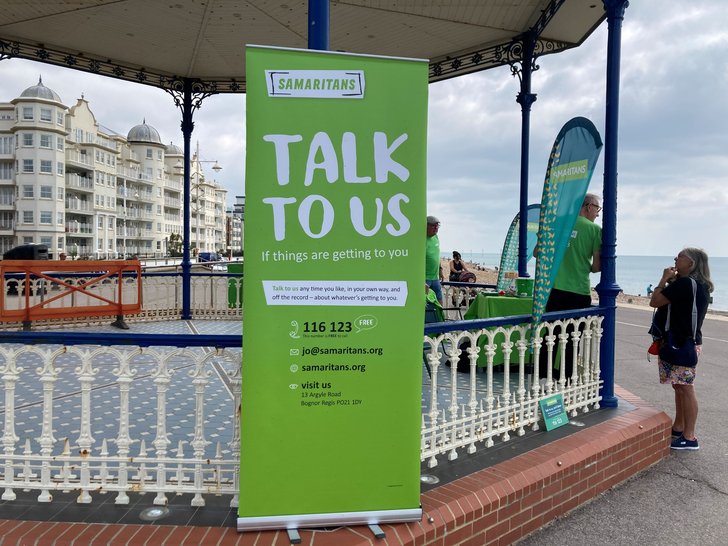 Talk to us sign at bognor bandstand