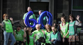 Volunteers celebrate 60 years of listening