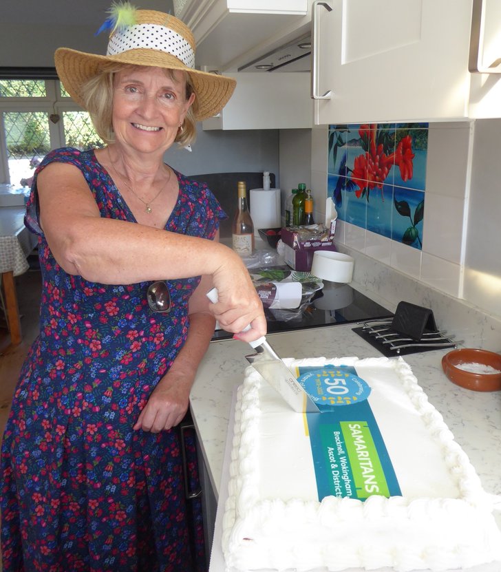 Local Samaritans director cuts 50th anniversary cake 6 August 2022