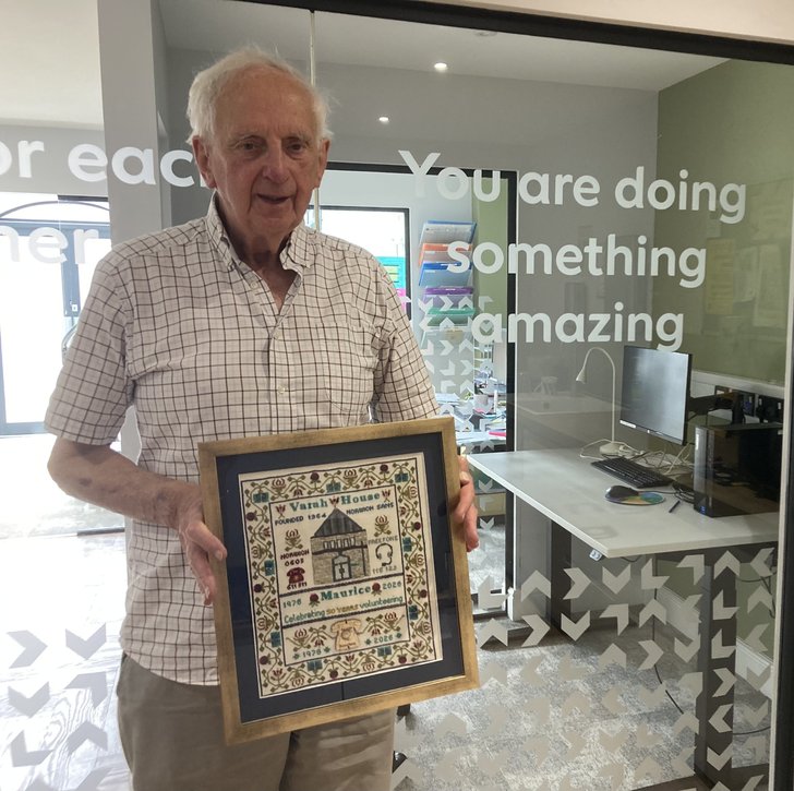 Maurice in the branch with his life time achieve award