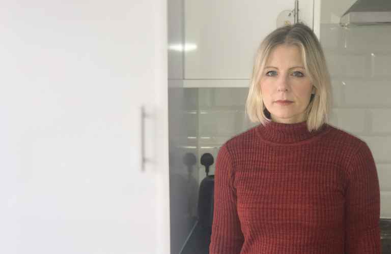 Nicola volunteer in red jumper.jpg