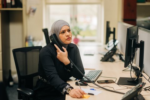 Woman-office-phone