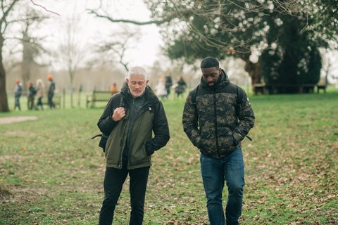 Two men walking outside Outside_054_AR