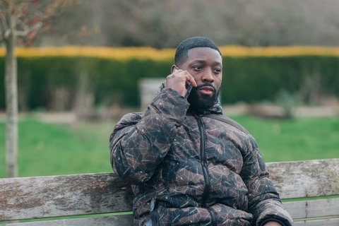 Man on his phone outside - Outside 345 AR