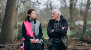 Two people sat outside talking (Outside_405_AR)