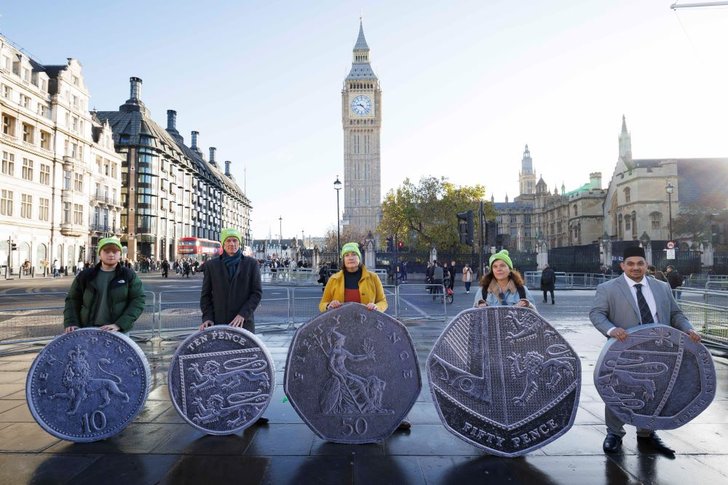 'Small change makes big change' - Samaritans in Parliament Square highlighting local suicide prevention in England costs only £1.40 per person