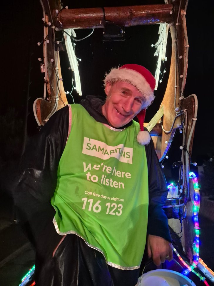 A weary volunteer getting a lift home