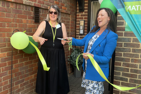 Sarah Green cutting ribbon