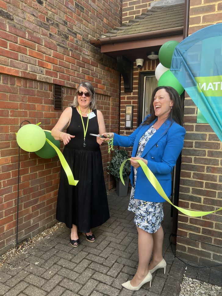 Sarah Green cutting ribbon