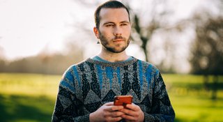 man-phone-outdoors-high-res.jpg