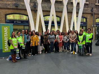 SHE Choir for Sing for Samaritans in May 2023 for Mental Health Awareness Week at King's Cross station