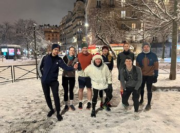 Sophie with her run club in Paris in the snow
