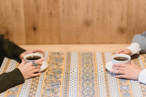 Brews together at table stock image - Brew Monday