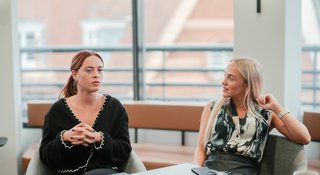 Two people in conversation at a Samaritans STEP workplace training session