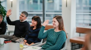 Three people taking part in a Samaritans STEP workplace training session
