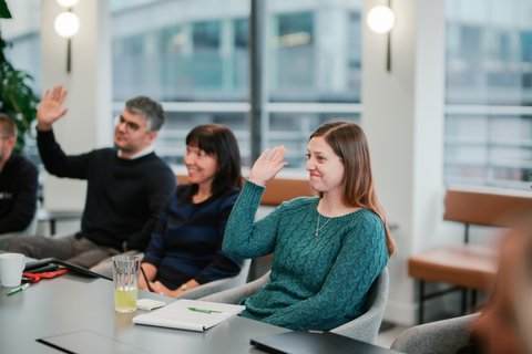Three people taking part in a Samaritans STEP workplace training session