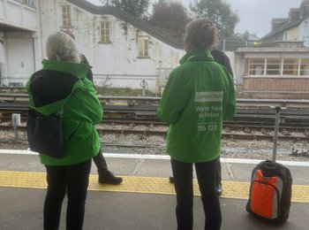 Volunteers on the train platform.