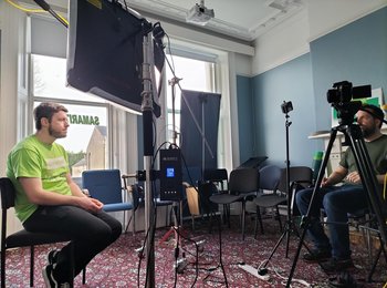 A student filming a video