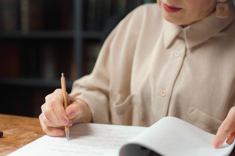 woman reading documents
